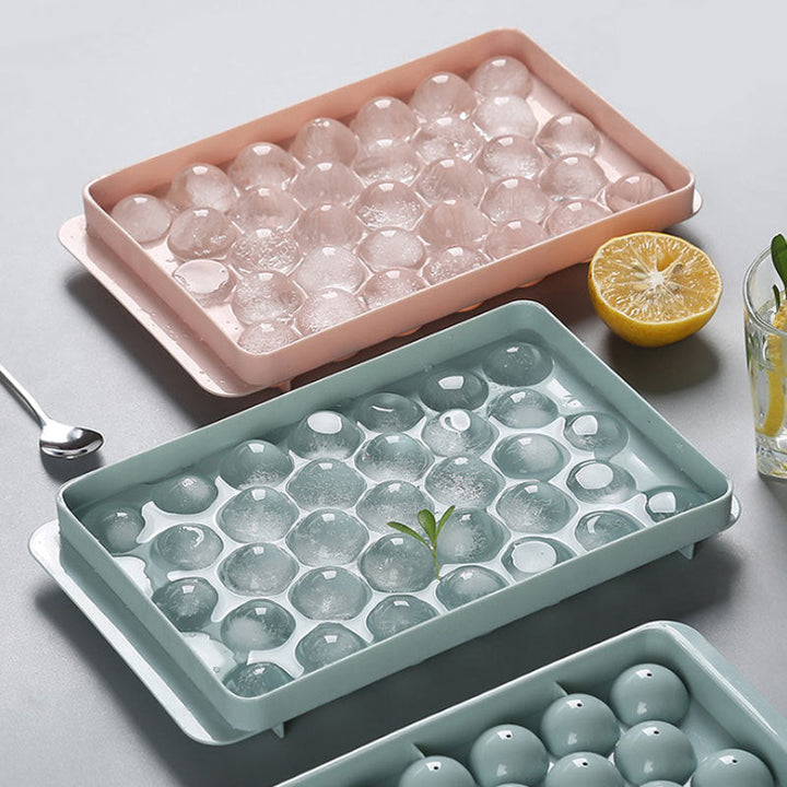"Elegant 3D-istillverkningsset i blå och rosa för köket, med diamant- och rundformade isformar för unika drinkupplevelser."