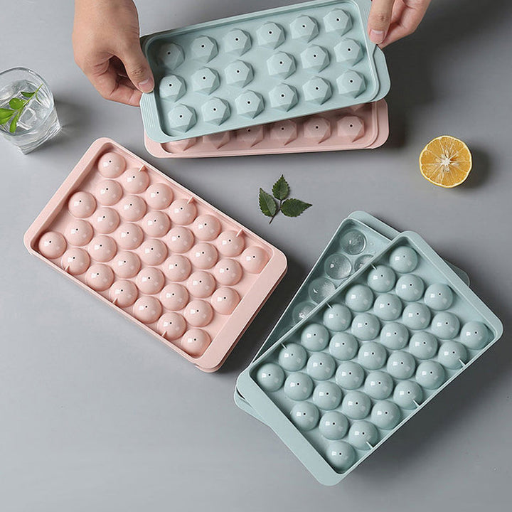 "Elegant 3D-istillverkningsset i blå och rosa för köket, med diamant- och rundformade isformar för unika drinkupplevelser."