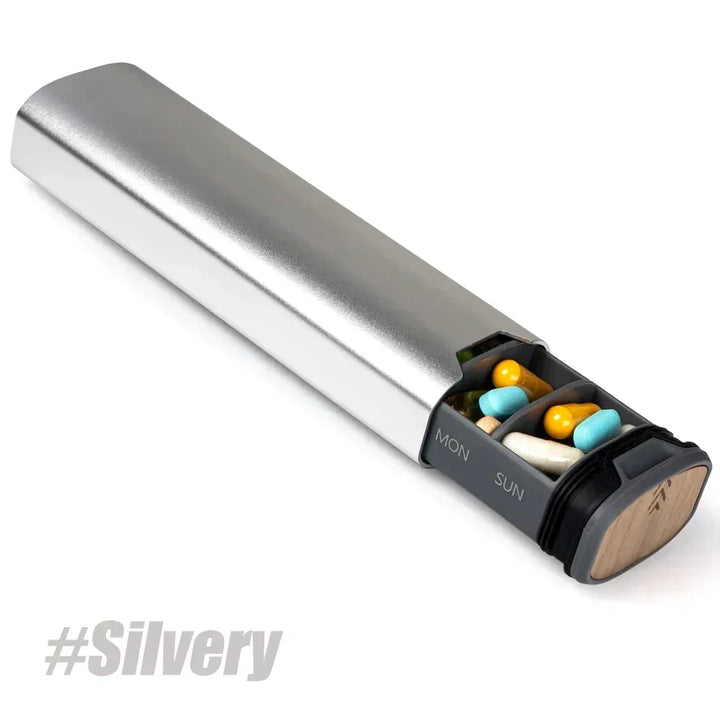 Håll ordning på mediciner med en elegant 7-dagars pillerdosa i trä & aluminium. För optimal hälsa.