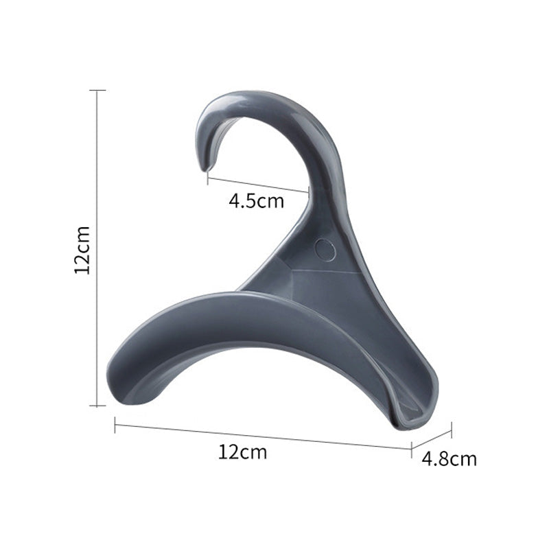 Elegant akryl väska hängare för kvinnor i svart/vitt, modern design för optimal förvaring och skydd av handväskor.