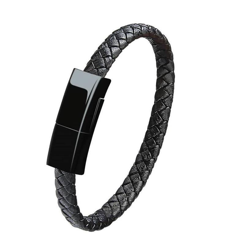 "Elegant armband i svart PU-läder med integrerad laddningskabel, perfekt för modern stil och funktionalitet."