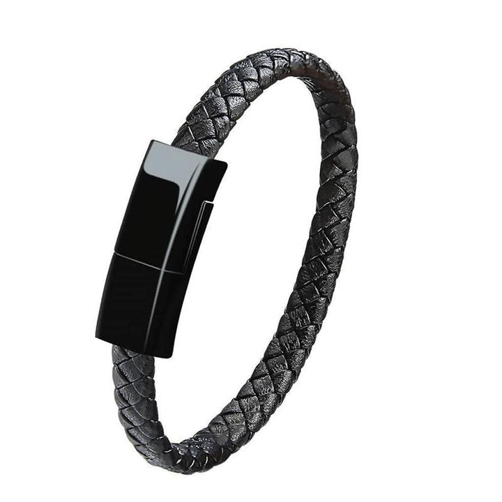 "Elegant armband i svart PU-läder med integrerad laddningskabel, perfekt för modern stil och funktionalitet."