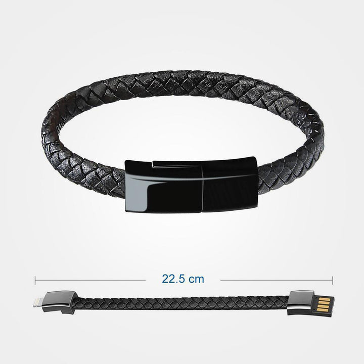 "Elegant armband i svart PU-läder med integrerad laddningskabel, perfekt för modern stil och funktionalitet."