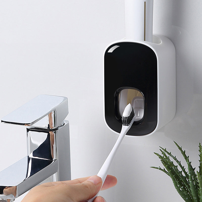 "Elegant automatisk tandkrämsklämma i modern design, sparar tid i badrummet, monteras enkelt på släta ytor."