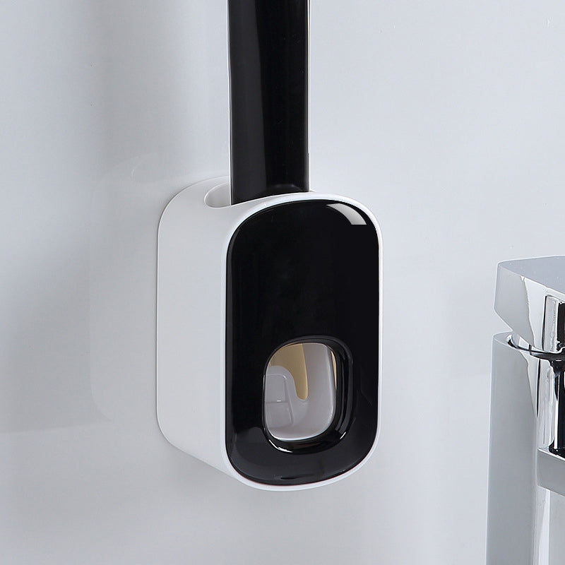 "Elegant automatisk tandkrämsklämma i modern design, sparar tid i badrummet, monteras enkelt på släta ytor."