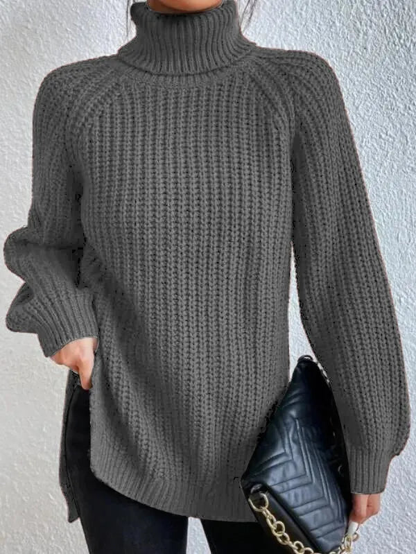 Närbild av den eleganta polotröjans ståkrage och raglanärmar i damstorlek