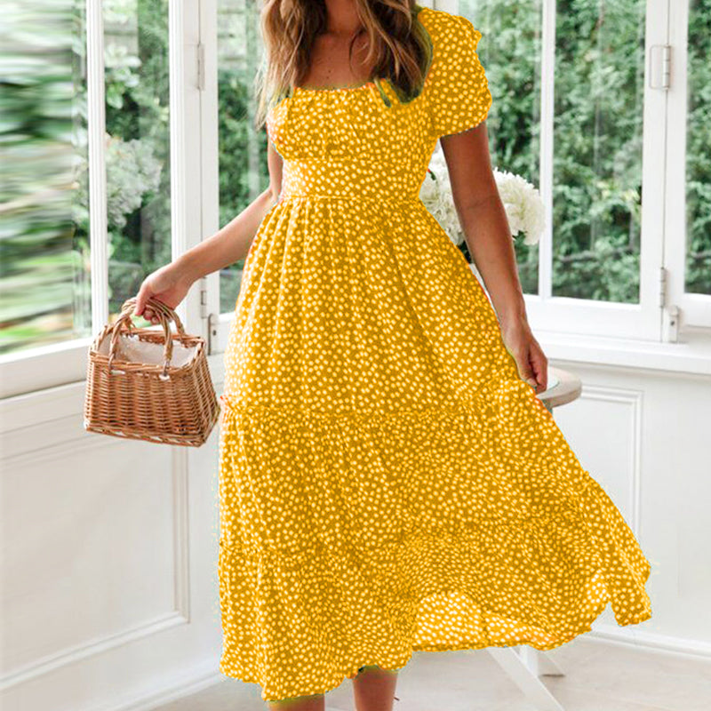 "Elegant blommig A-linje klänning med fyrkantig hals och puffärmar för kvinnor, perfekt för vår och sommar."