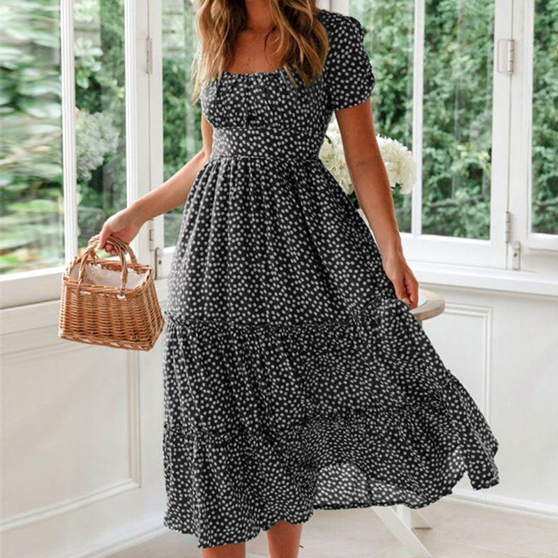 "Elegant blommig A-linje klänning med fyrkantig hals och puffärmar för kvinnor, perfekt för vår och sommar."
