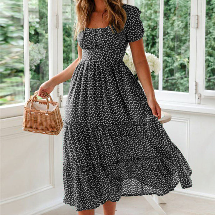 "Elegant blommig A-linje klänning med fyrkantig hals och puffärmar för kvinnor, perfekt för vår och sommar."