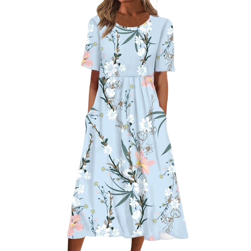 "Elegant blommig A-linje klänning med rund hals i vitt och blått, midi-längd för en feminin och sofistikerad stil."