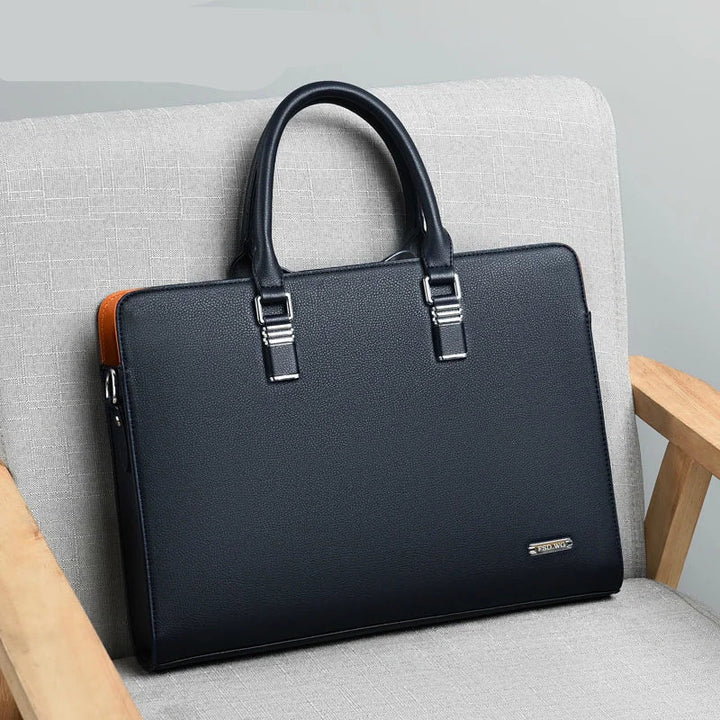 Svart professionell laptopväska för herr. Rymlig affärsväska, perfekt för 38cm laptop och dokument.