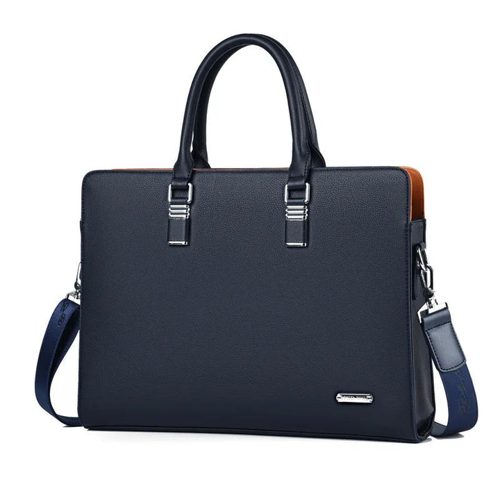 Brun affärsväska för herr, skyddar 35cm laptop. Elegant portfölj med gott om plats för organisation.
