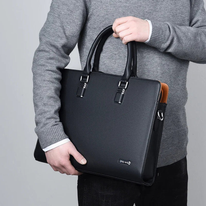 Elegant herrportfölj i svart. Mångsidig laptopväska för 35/38cm dator, passar blå och brun färg också.