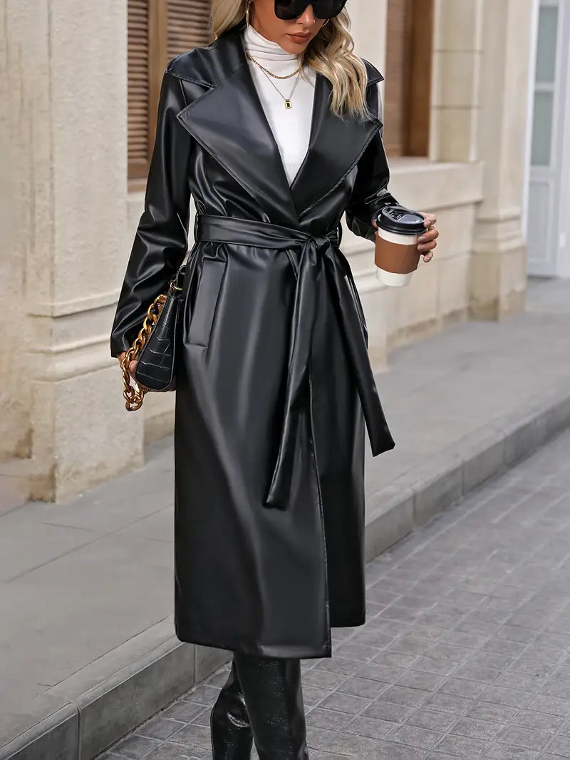Brun elegant vinterkappa för kvinnor, lång modell som skapar en tidlös siluett, perfekt för kalla dagar.