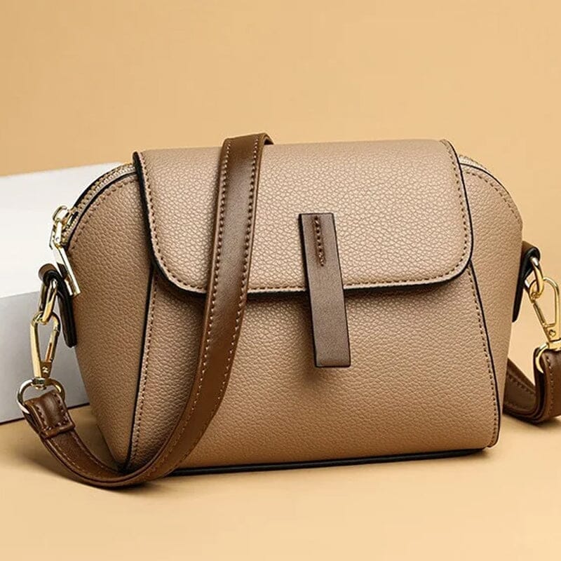 "Elegant crossbody damväska i mjukt läder med stilren design för moderna kvinnor; perfekt för mode och funktionalitet."