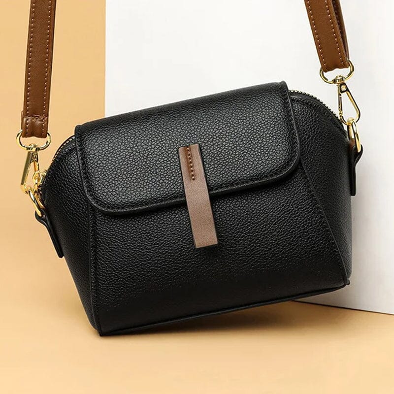 "Elegant crossbody damväska i mjukt läder med stilren design för moderna kvinnor; perfekt för mode och funktionalitet."