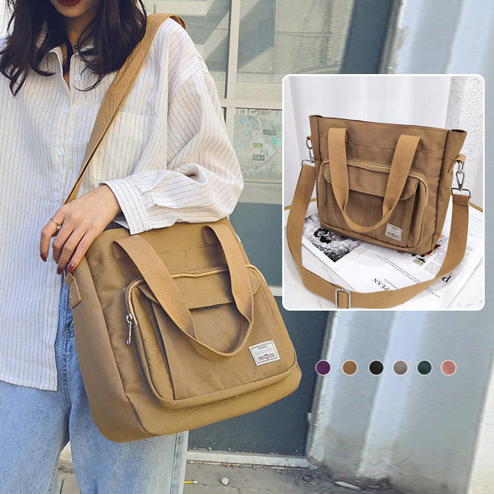 "Elegant crossbody-handväska i nylon för damer, svart och slitstark, kan bäras som axelväska, justerbar rem."