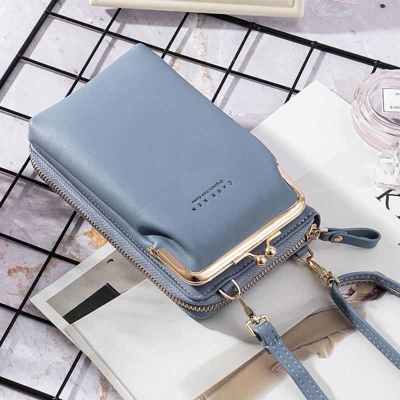 "Elegant crossbody kurirväska i PU-läder för kvinnor med justerbar rem, flerrumsdesign, finns i flera färger."