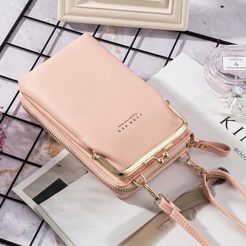 "Elegant crossbody kurirväska i PU-läder för kvinnor med justerbar rem, flerrumsdesign, finns i flera färger."