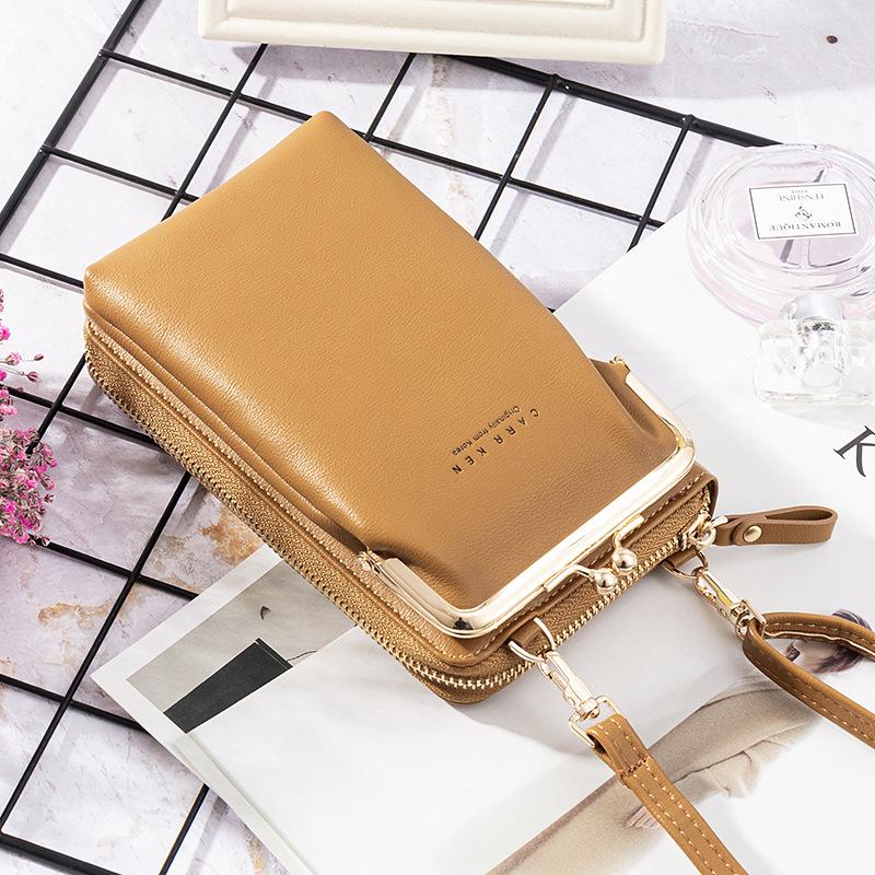 "Elegant crossbody kurirväska i PU-läder för kvinnor med justerbar rem, flerrumsdesign, finns i flera färger."