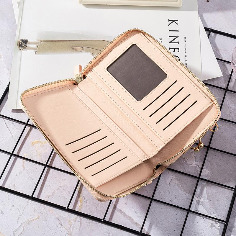 "Elegant crossbody kurirväska i PU-läder för kvinnor med justerbar rem, flerrumsdesign, finns i flera färger."