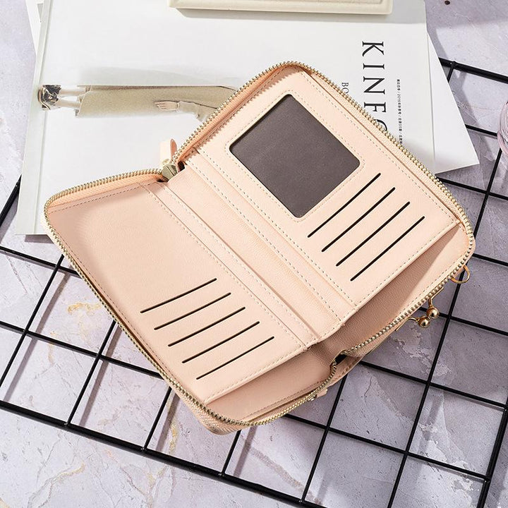 "Elegant crossbody kurirväska i PU-läder för kvinnor med justerbar rem, flerrumsdesign, finns i flera färger."
