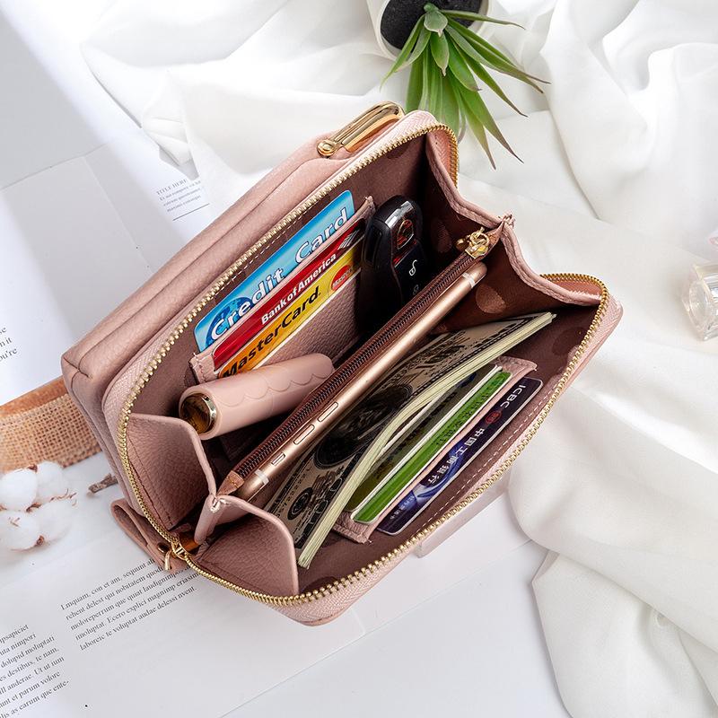 "Elegant crossbody kurirväska i PU-läder för kvinnor med justerbar rem, flerrumsdesign, finns i flera färger."