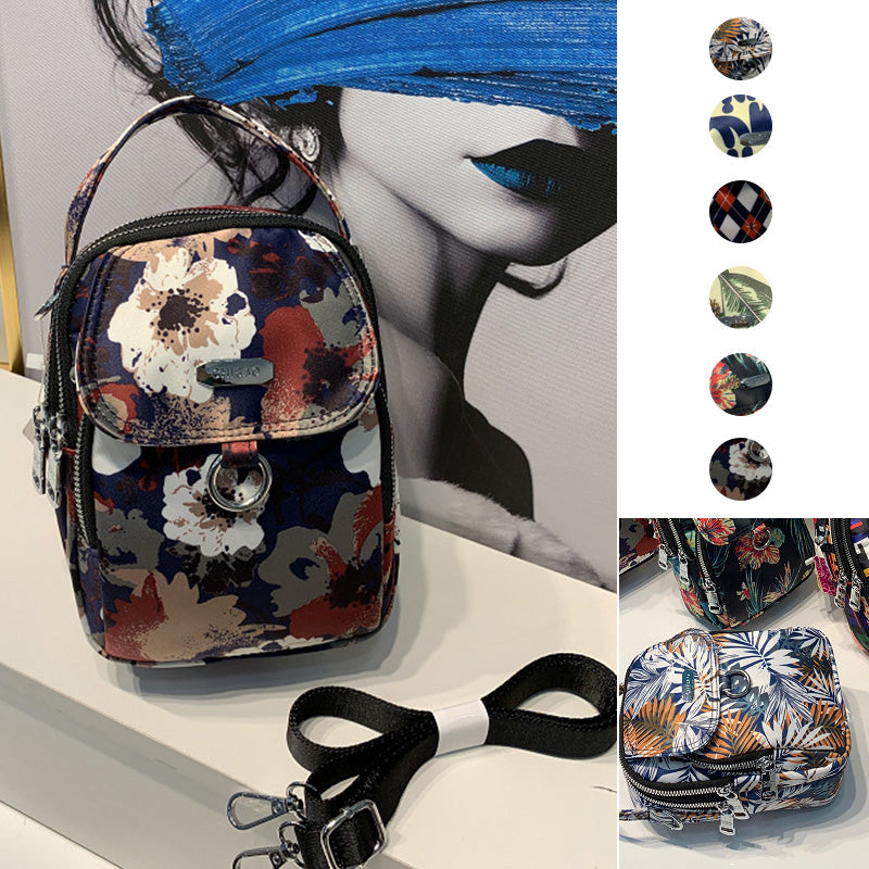 "Elegant crossbody-väska för damer i slitstarkt, vattenavvisande nylon, justerbar axelrem, praktisk och stilren design."