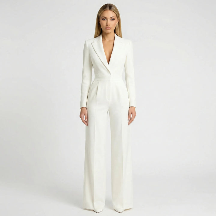 Chic dam helkroppsplagg i jumpsuit-blazerstil med vida ben och smickrande markerad midja.