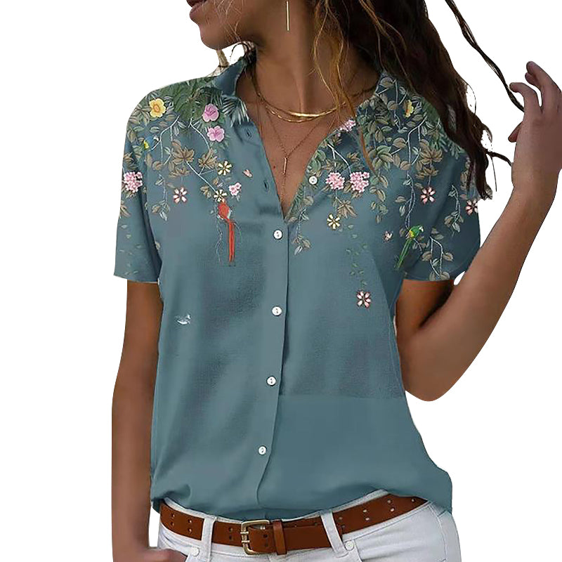 "Elegant dam blommig kortärmad polyester skjorta med charmigt mönster, perfekt för vardag och semesterstunder."