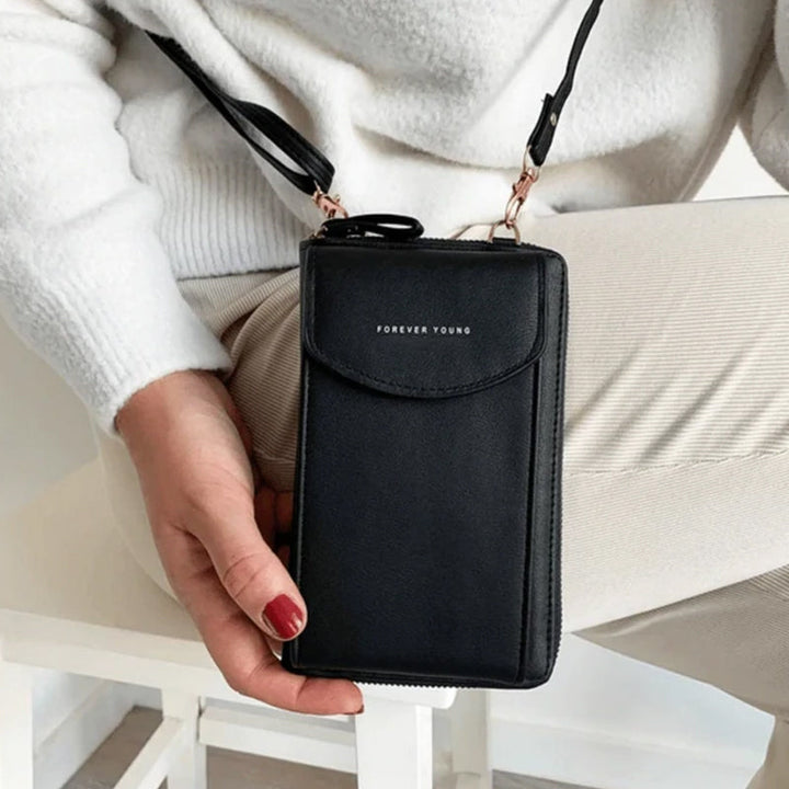 "Elegant dam crossbody telefonväska i rött PU-läder med avtagbar rem, rymligt fack för värdesaker, mångsidig design."