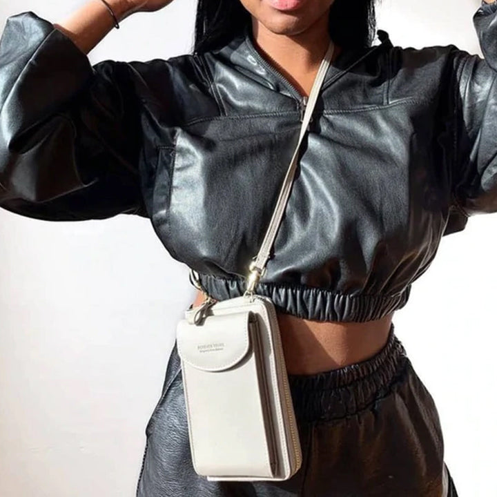 "Elegant dam crossbody telefonväska i rött PU-läder med avtagbar rem, rymligt fack för värdesaker, mångsidig design."