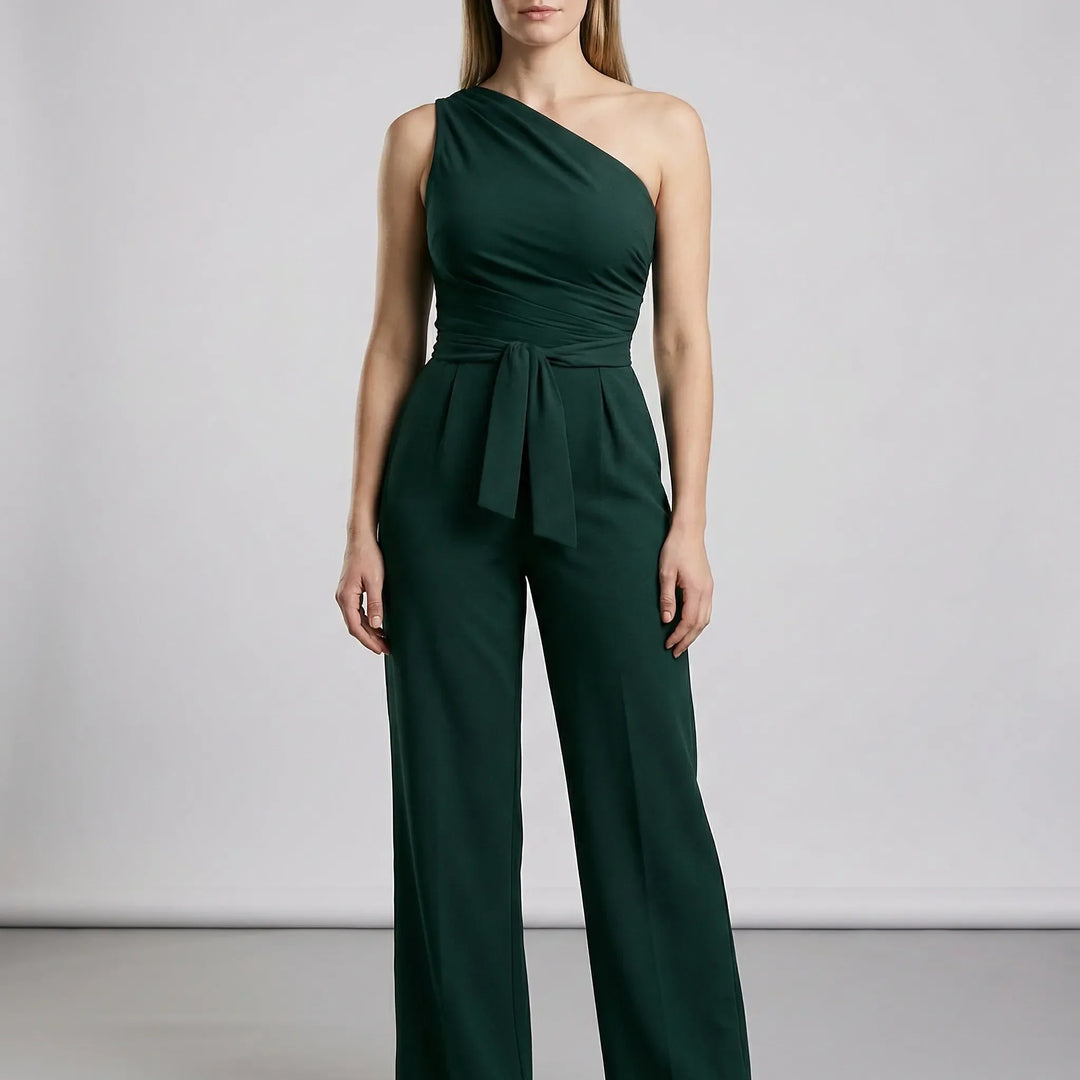 Bekväm enaxlad dam jumpsuit med vida ben och knytskärp. Stilren och modern för sommarens mode.