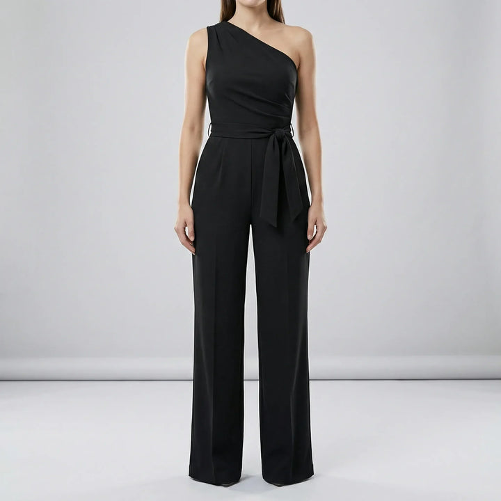 Elegant dam jumpsuit för sommar och mode. Enaxlad design med bekväm passform, perfekt för varma dagar.
