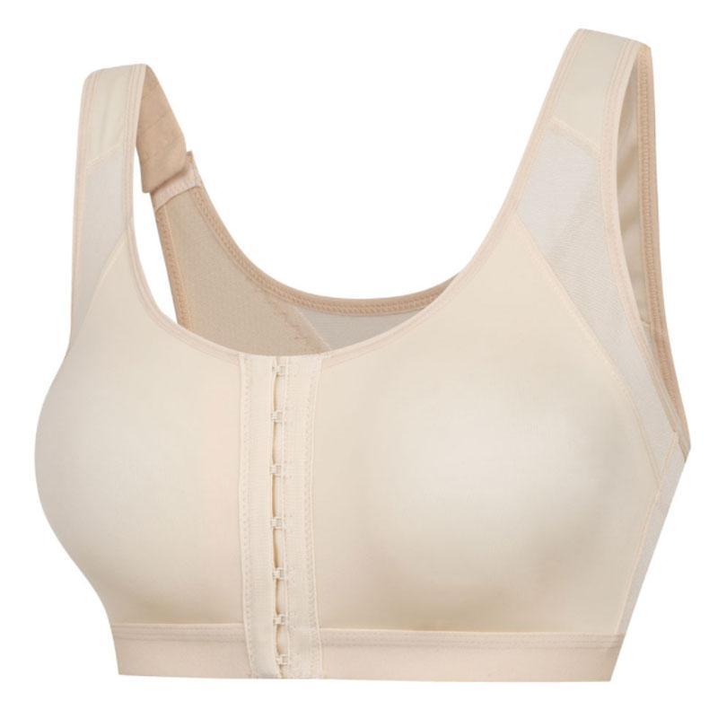 "Elegant dam sport-BH utan bygel med justerbara band, beige och svart, för komfort och stöd vid träning."
