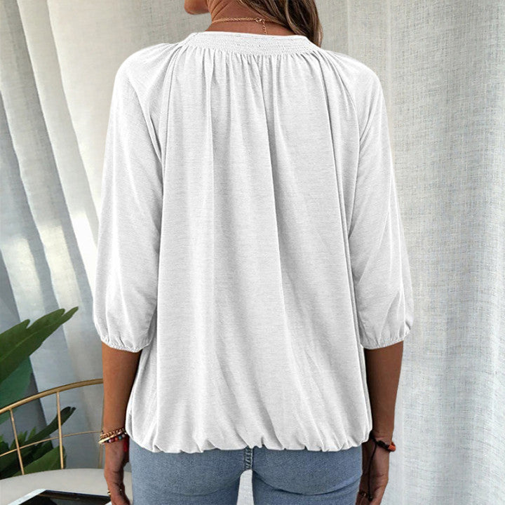 "Elegant dam T-shirt med 3/4 ärm i bomullsblandning, rund hals och i olika färger, perfekt för alla tillfällen."
