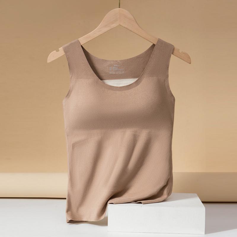 Elegant dam termisk fleeceväst i grå färg, stilren design med högvärmande och andningsbart material, perfekt för kalla dagar.