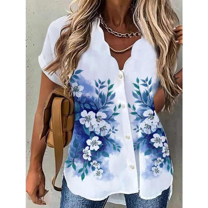 "Elegant dam V-ringad kortärmad blus med blommigt mönster för en feminin och stilfull look."