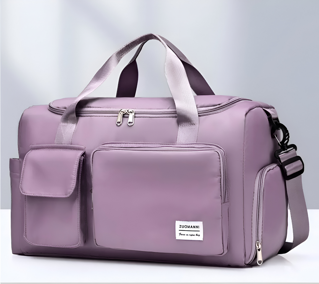 Elegant weekendväska för dam, dufflebag med flera fack som håller dig organiserad.