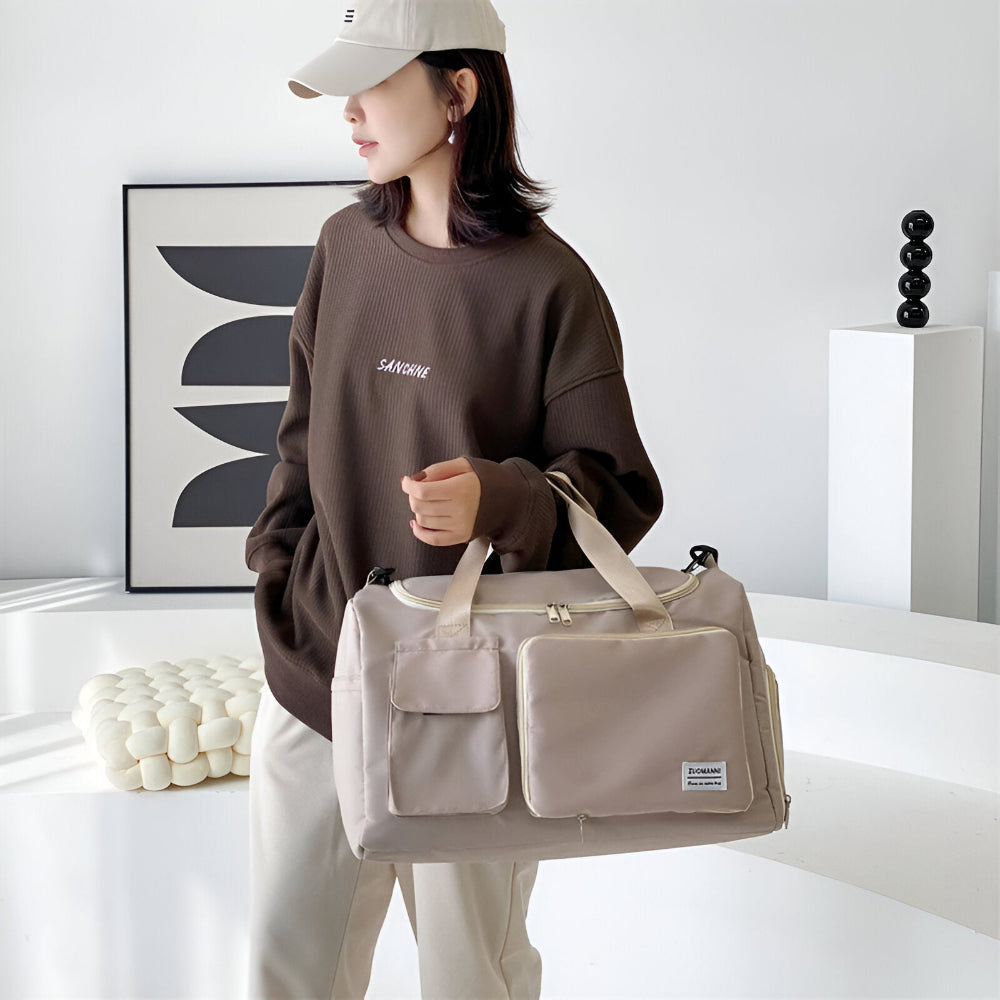 Svart dam dufflebag, perfekt som stilren weekendväska, gymväska & praktisk resebag.