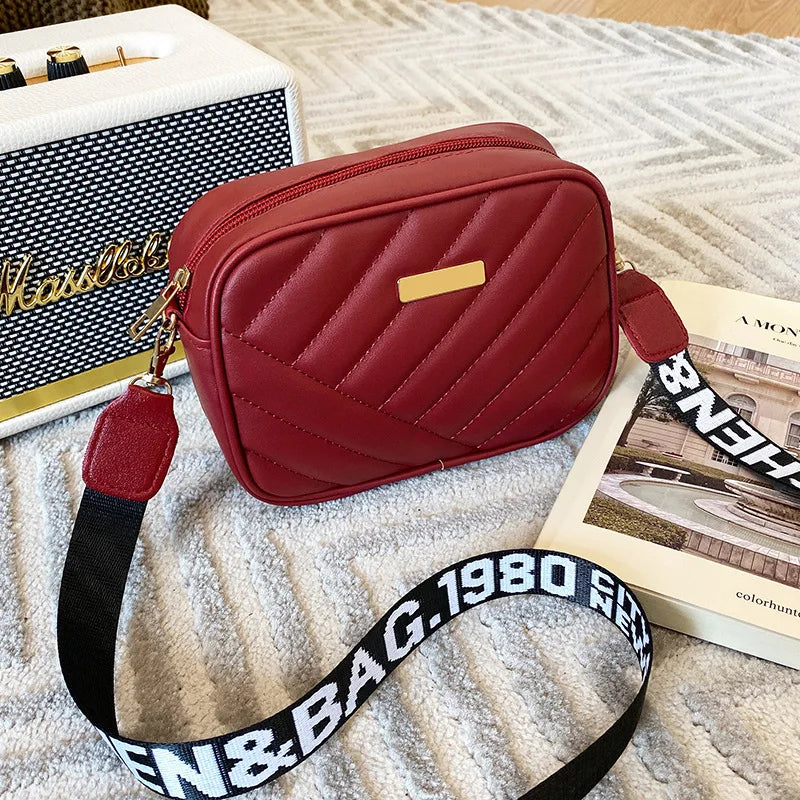 Dam Elegant Zip 'n Go axelväska. Elegant handväska med dragkedja, en chic och praktisk accessoar.