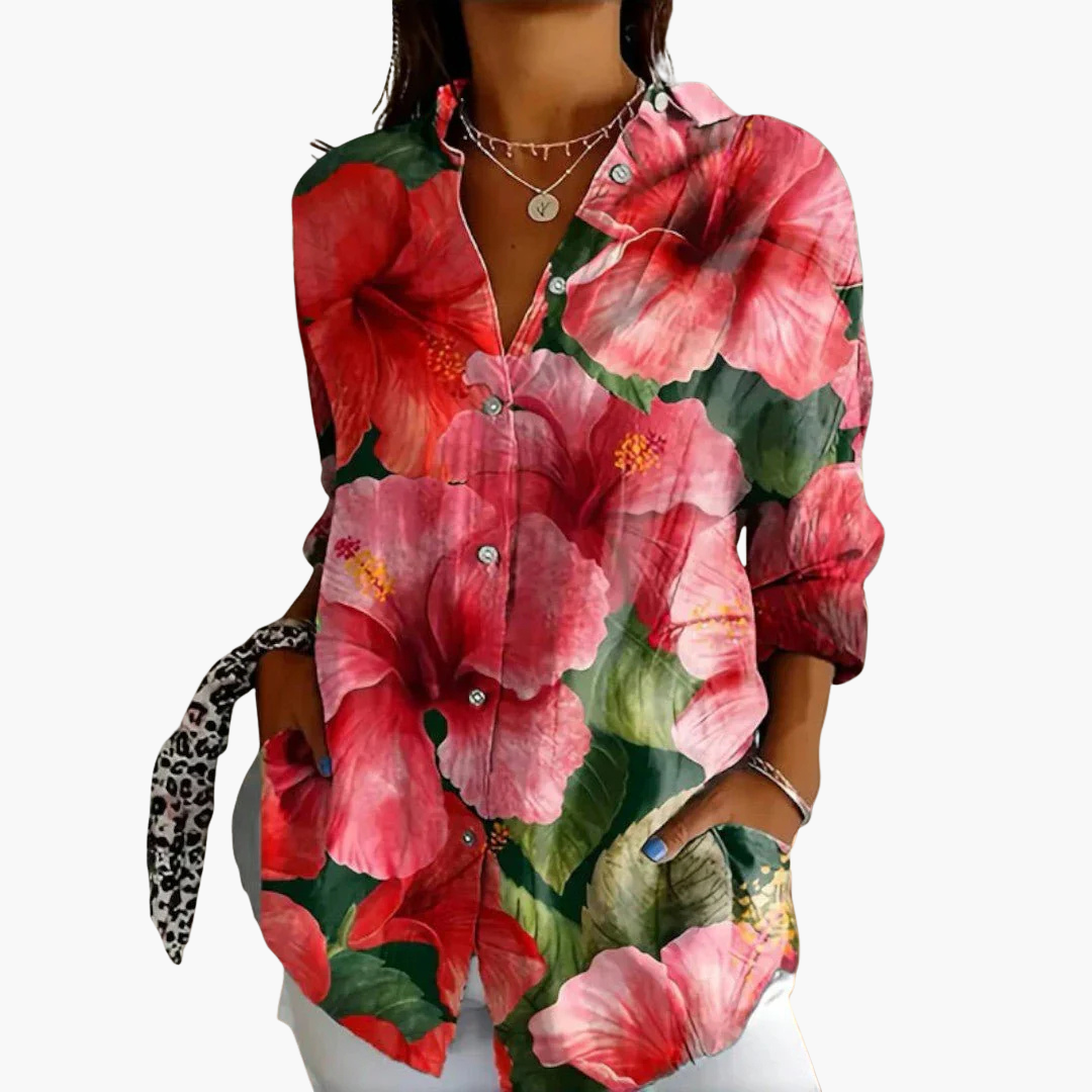 Elegant damblus med klassisk krage och knäppning. Perfekt för kontor och affärsmöten.