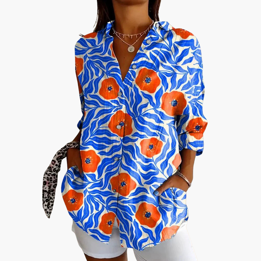 Blå enfärgad damblus med lång ärm, krage och knäppning, perfekt för en chic kontorslook.