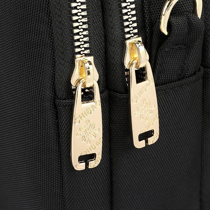 Elegant damers nylon crossbody kurirväska med multifickor, justerbar axelrem, tillgänglig i flera färger.