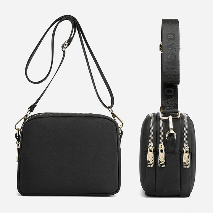 Elegant damers nylon crossbody kurirväska med multifickor, justerbar axelrem, tillgänglig i flera färger.