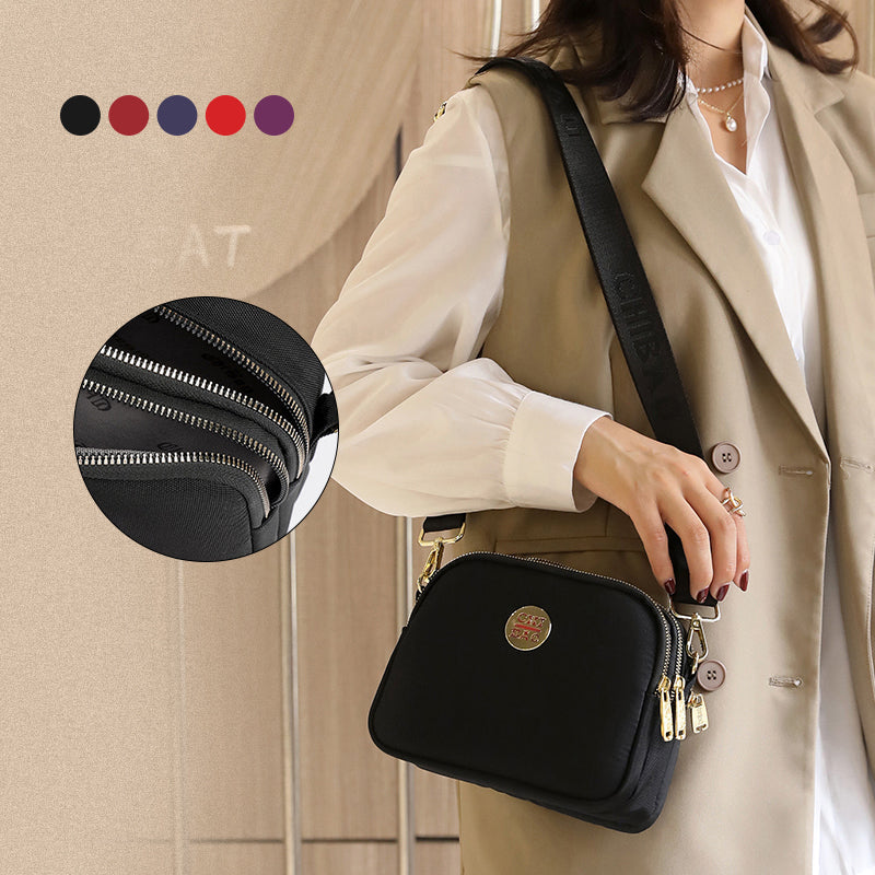 Elegant damers nylon crossbody kurirväska med multifickor, justerbar axelrem, tillgänglig i flera färger.