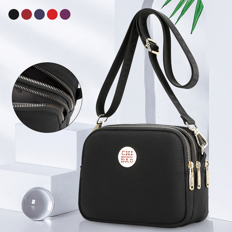 Elegant damers nylon crossbody kurirväska med multifickor, justerbar axelrem, tillgänglig i flera färger.