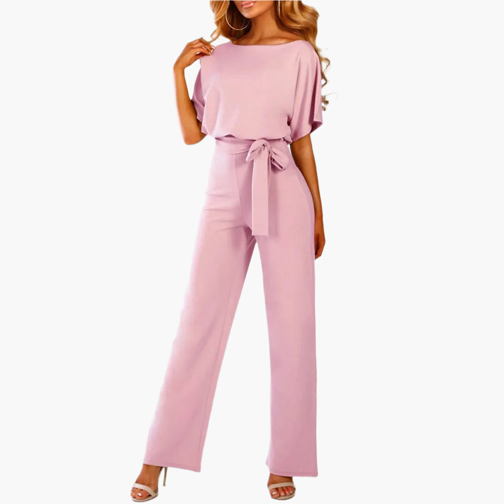 Mångsidig elegant damjumpsuit med vida ben och ärmdetaljer. Passar till både fest och middag.