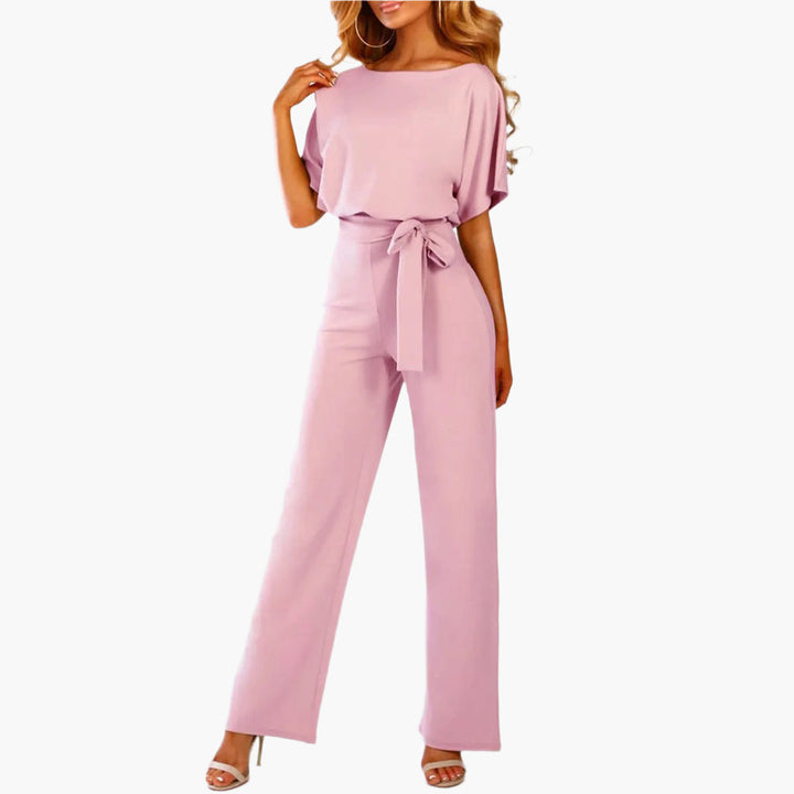 Mångsidig elegant damjumpsuit med vida ben och ärmdetaljer. Passar till både fest och middag.