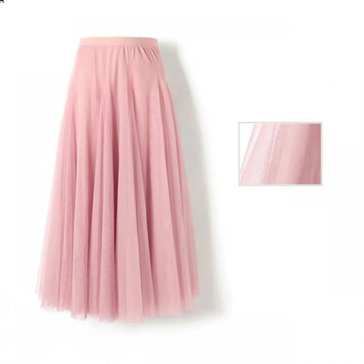 Feminina midi-damkjol med hög midja, elegant volym. En mångsidig festkjol eller vardagskjol för damer.